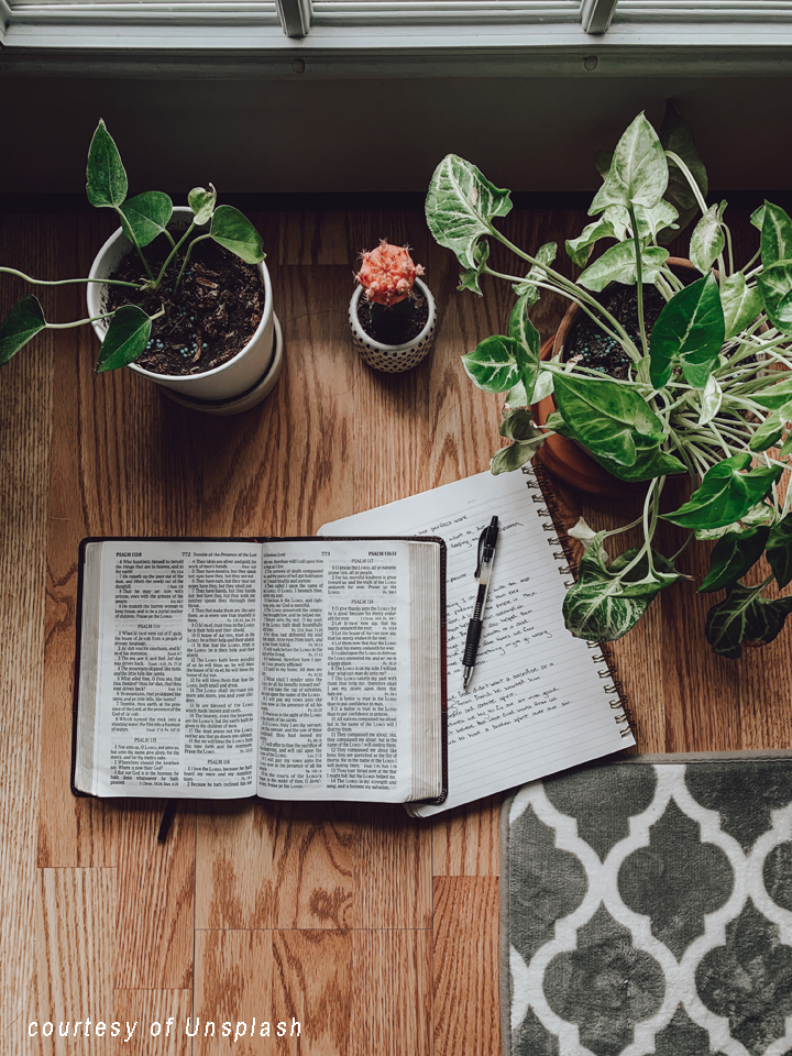 journal and bible on table